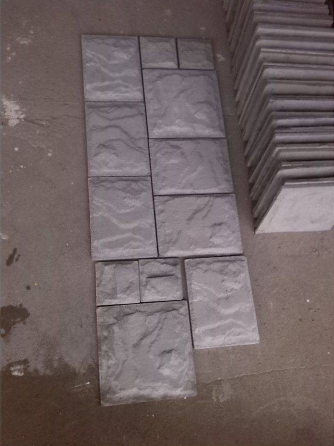 Облицовка цоколя дома бетонной плиткой «рваный камень» своими руками