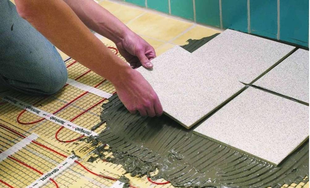 Кварцвиниловая плитка на теплый пол: особенности материала и способы монтажа